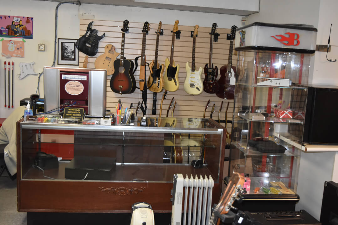 in store image showing guitars